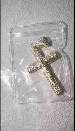 Gold cross with diamonds