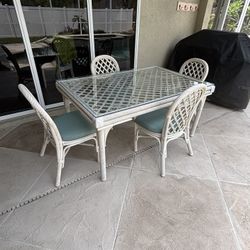 Dining Table In Four Chairs