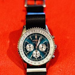 Breitling Navitimer with a striking blue-green dial with contrasting silver sub-dials 