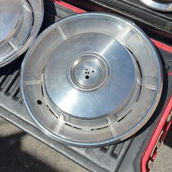 67 Caddy Hubcaps 