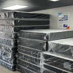 Stacks Of Mattress Being Liquidated For Memorial Day Weekend 