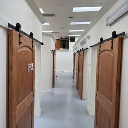 Knotty Alder Solid Wood Bard Doors + Hardware