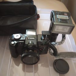 CANON CAMERA WITH FLASHER