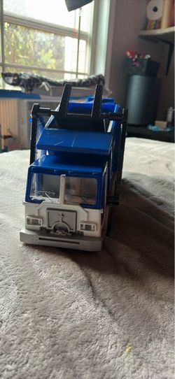 Blue and gray TONKA Toy Garbage Truck