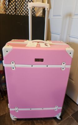 Large pink suitcase