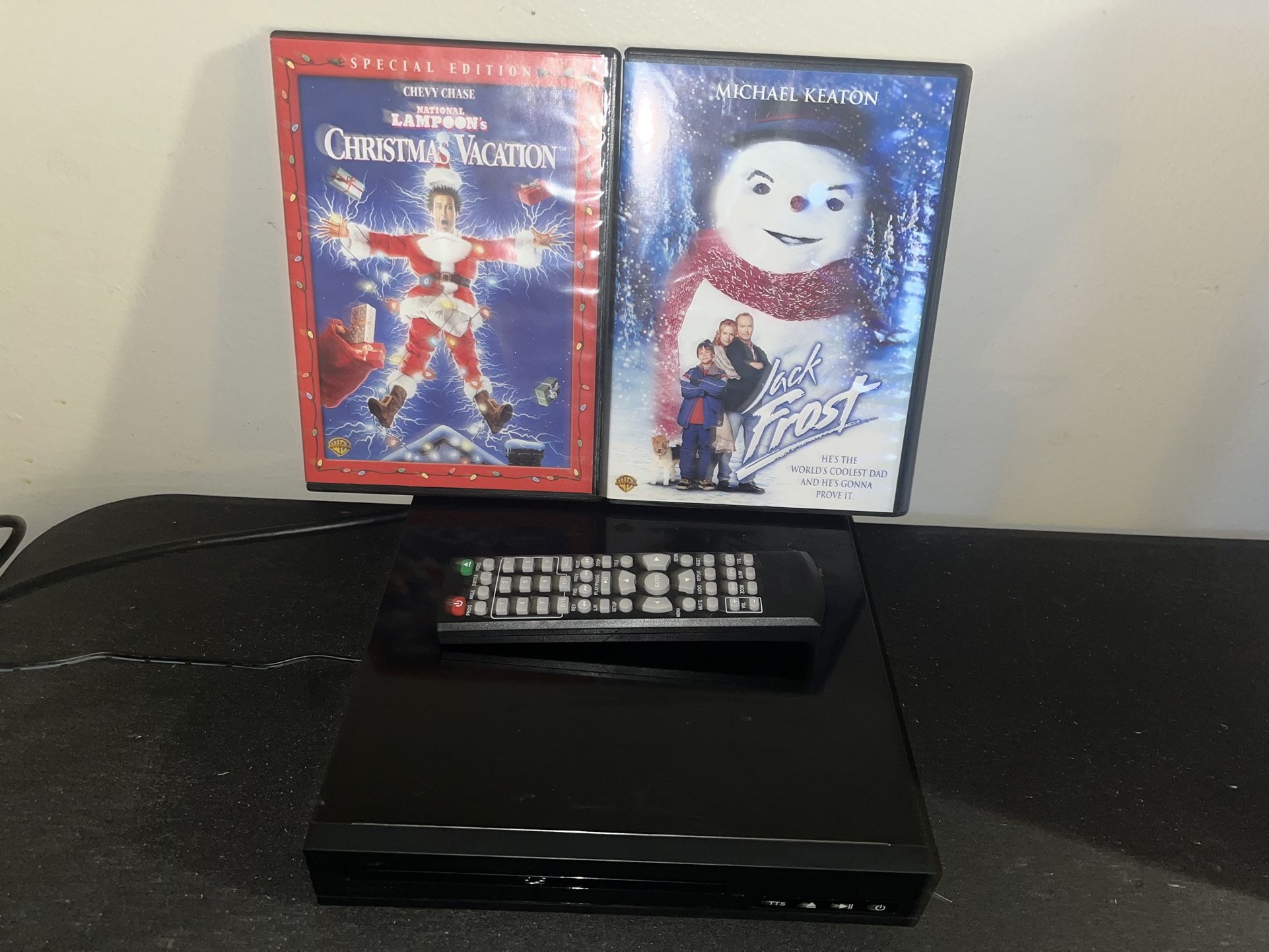 DVD player And Two Movies