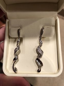 Diamond silver swirl earrings