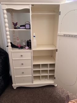 wardrobe armoire with a built-in vanity