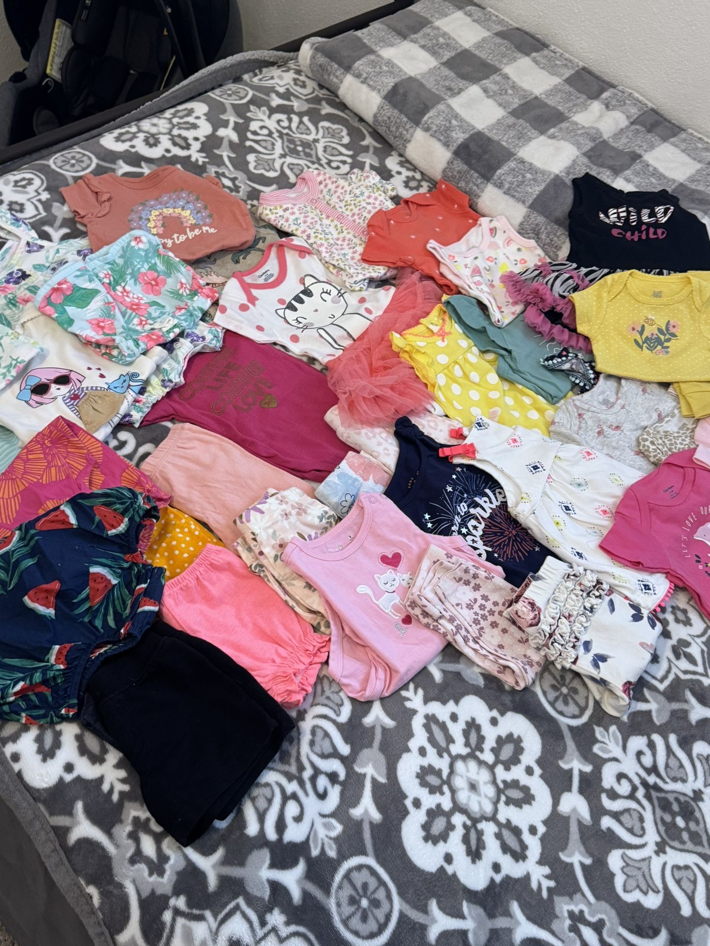 Baby Clothes, And A Diaper Bag