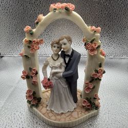 Bride & Groom Figurine Under Arch Wedding Cake Topper