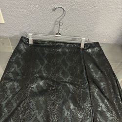 Black snakeskin mini skirt