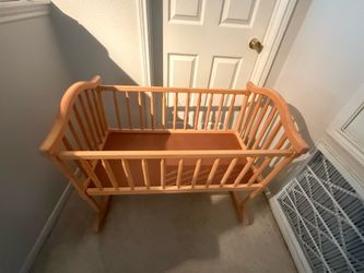 Wooden rocking cradle