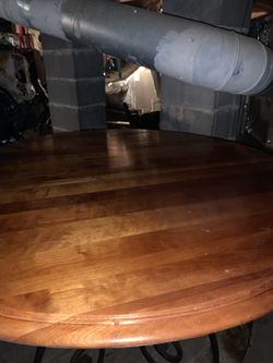 Solid Oak Table With Rod Iron Legs