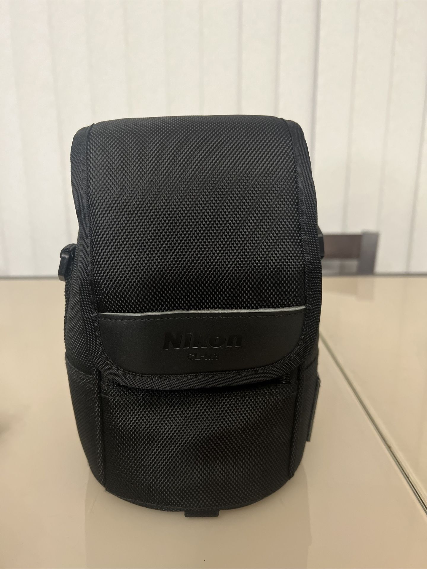 Nikon CL-M3 Lens Case Only For AF-S 14-24mm f/2.8G & AF-S 24-70mm f/2.8G lenses. The case is in excellent condition and currently does not have a stra
