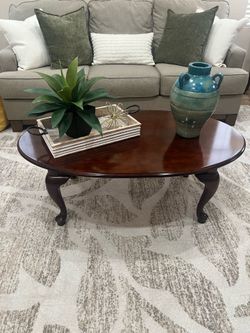Cherrywood coffee table, quality wood, near perfect condition,  measures 17.5 H,  45.5L,  27W.