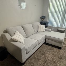Beige Couch with pillows 