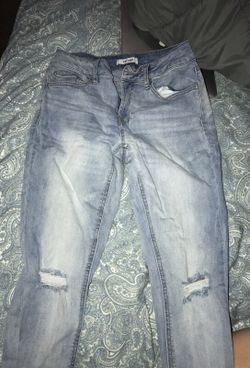 Light colored ripped skinny jeans