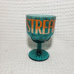 
Vintage "Streaker of the Year" Goblet/Chalice Glass Aqua Blue with Orange Print . Very good condition.  Measures 6" T X 4" W .