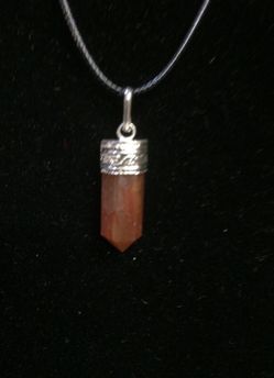 Carnelian pendant with black cord