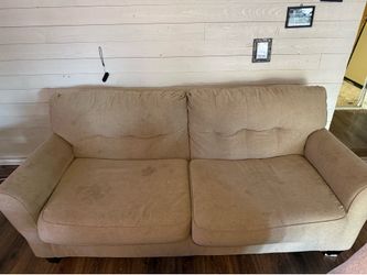 Beige pull out couch