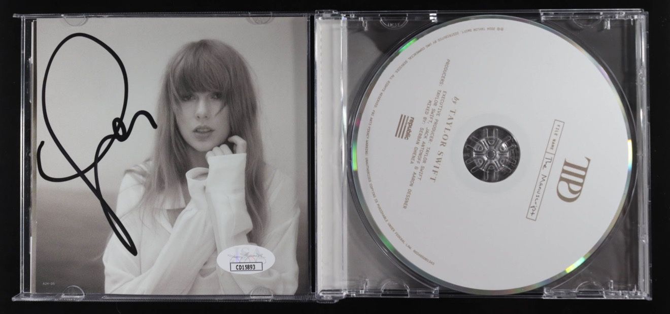 Autographed CD By Taylor Swift. 