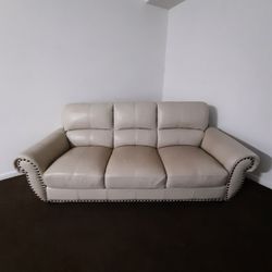 Cream Couch With Ottoman