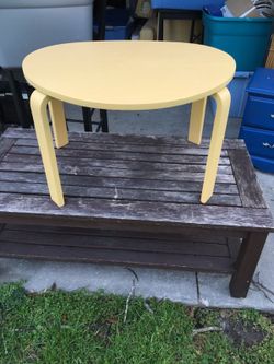 Oval shaped all wood accent table