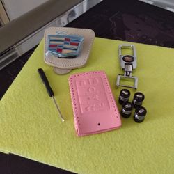 Cadillac Keychain Sun Visor Glasses Valve Stem $40.