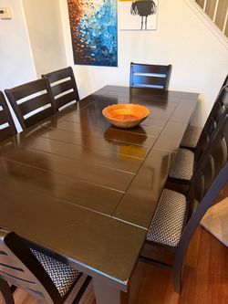 Brown table plus 8 chairs