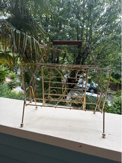 Brass and wood magazine rack