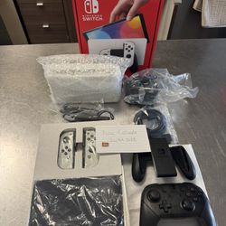Nintendo Switch OLED + Pro Controller And 128 GB SD Card