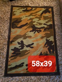 Camouflage floor rug