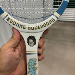 vintage Dunlop Evonne Goolagong wooden tennis racquet.  This model features a photo decal of Evonne Goolagong