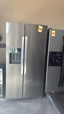 Nice Whirlpool stainless steel side by side refrigerator