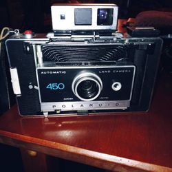 Vintage Polaroid 450 Camera And. A Vintage Polaroid 100 Camera With Cases