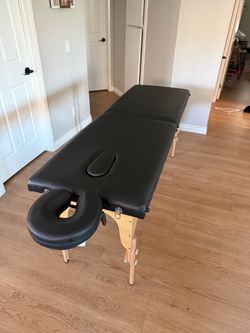 Massage table