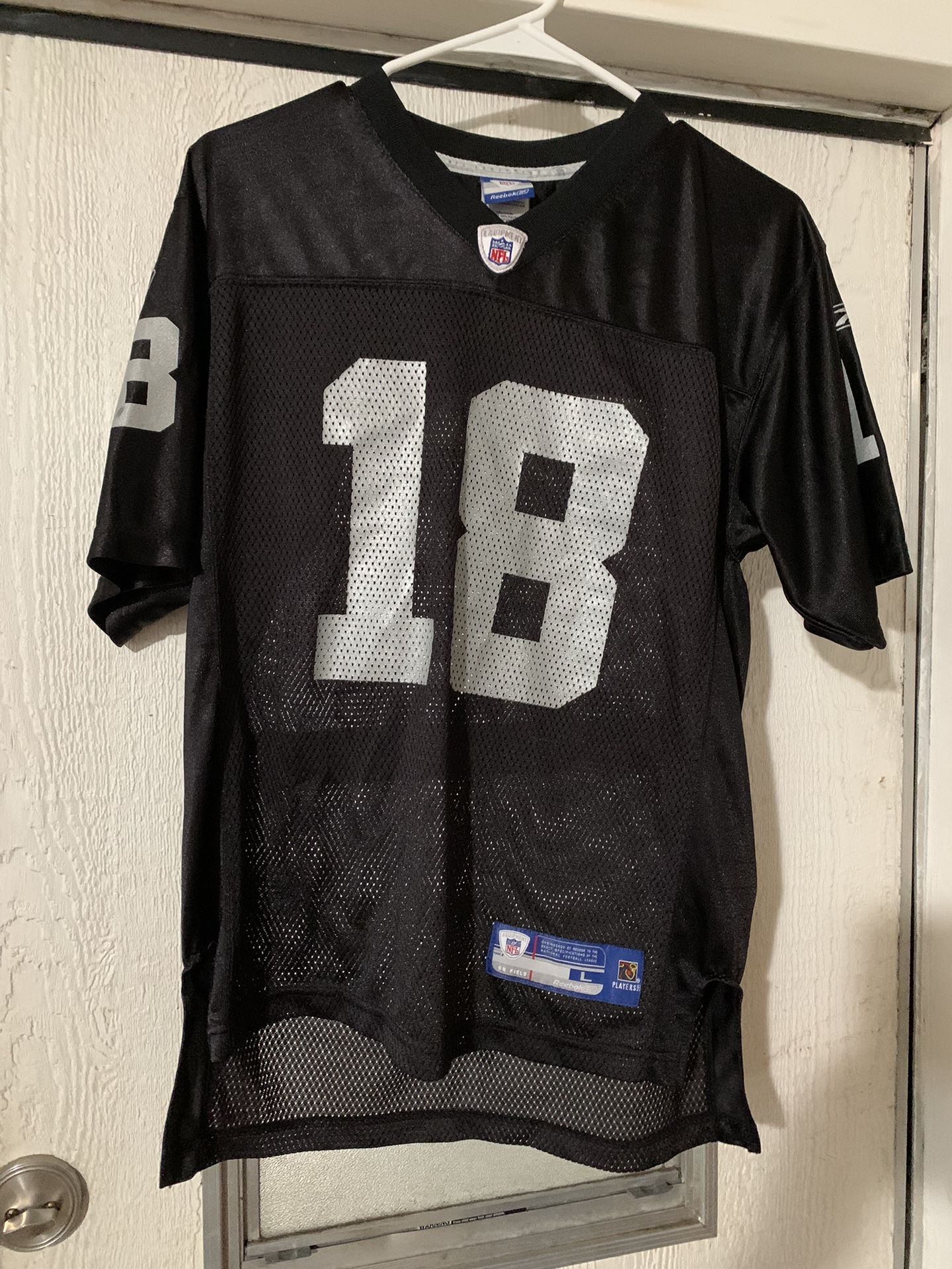 Randy moss Oakland Raiders NFL jersey #18 black size L (14-16)