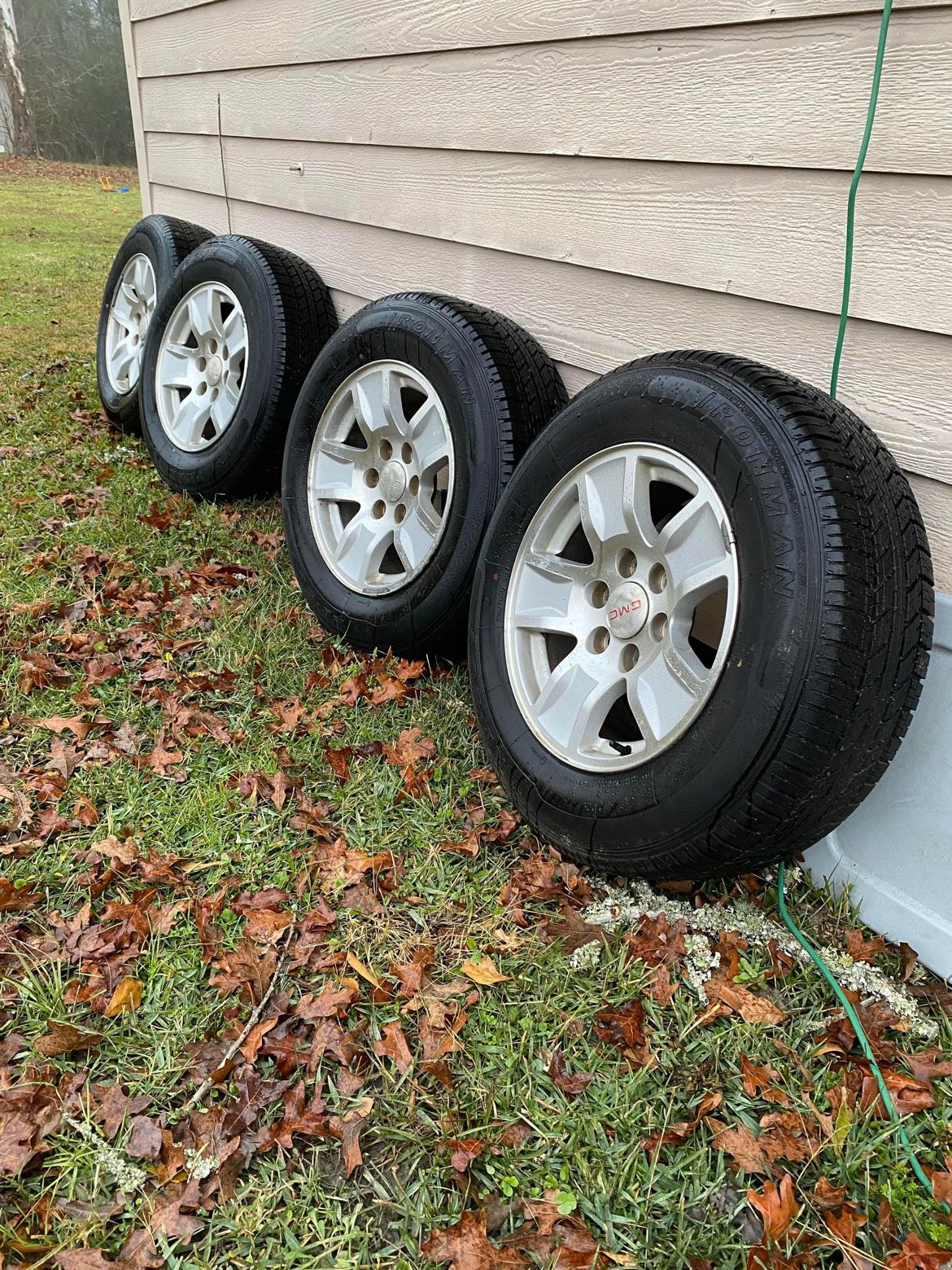 gmc stock 17 inc rims with brand new tires