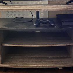 TV Stand (TV AND SYSTEM NOT INCLUDED)Need gone!!!