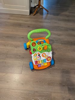 Free baby stuff Walker, activity center, baby feeder etc..