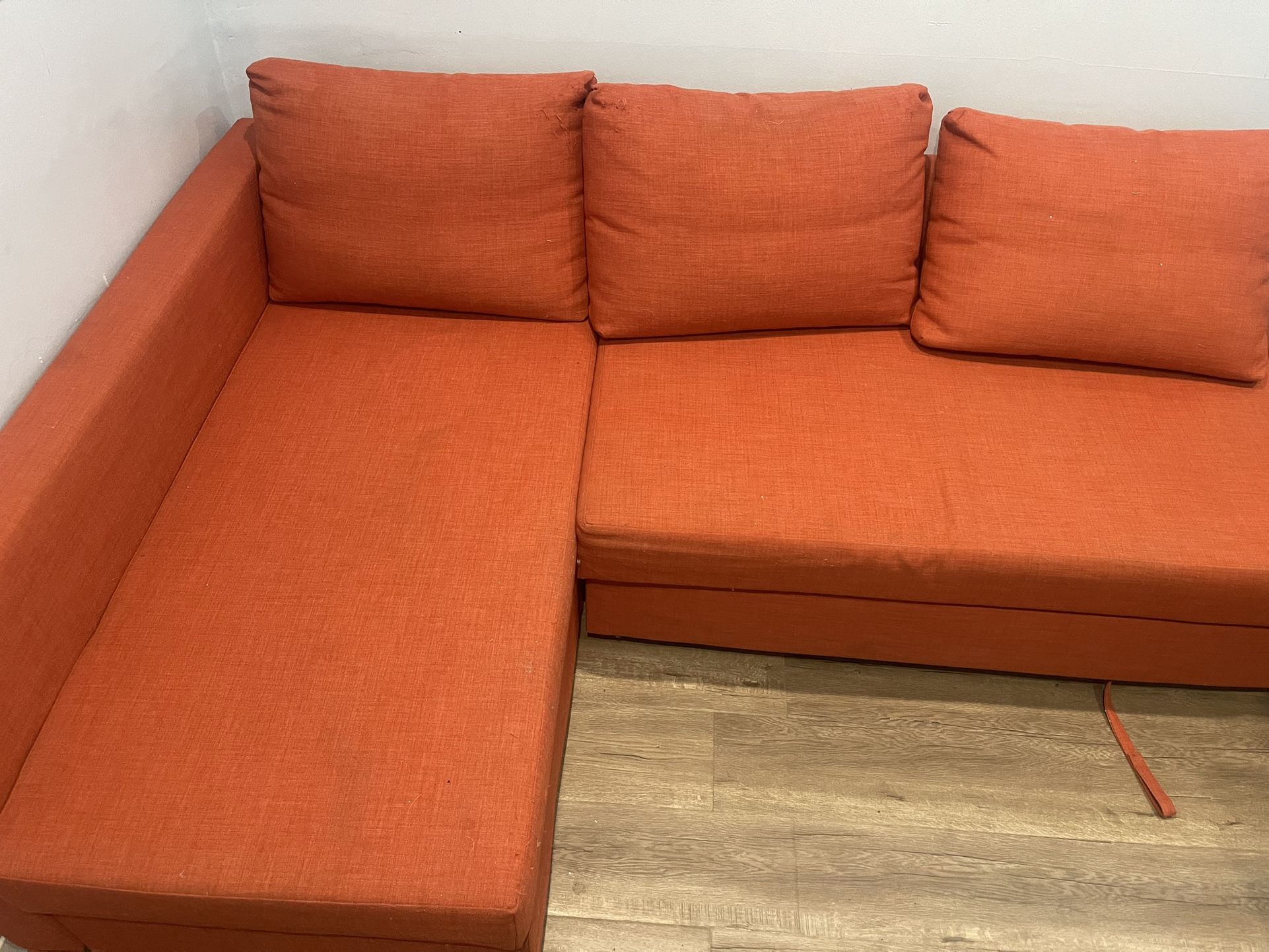 Orange Sectional Pullout Couch