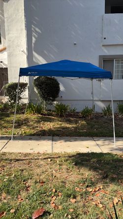 Fold up tent 10-FT X 10-FT INSTANT SLANT-LEG CANOPY TOLDO INSTANTANEO CON PATAS INCLINADAS DE 3 X 3 METROS • Durable steel frame • Versatile feet and