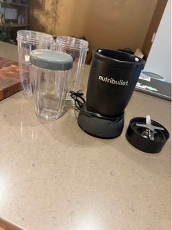 NutriBullet blender and 3 cups