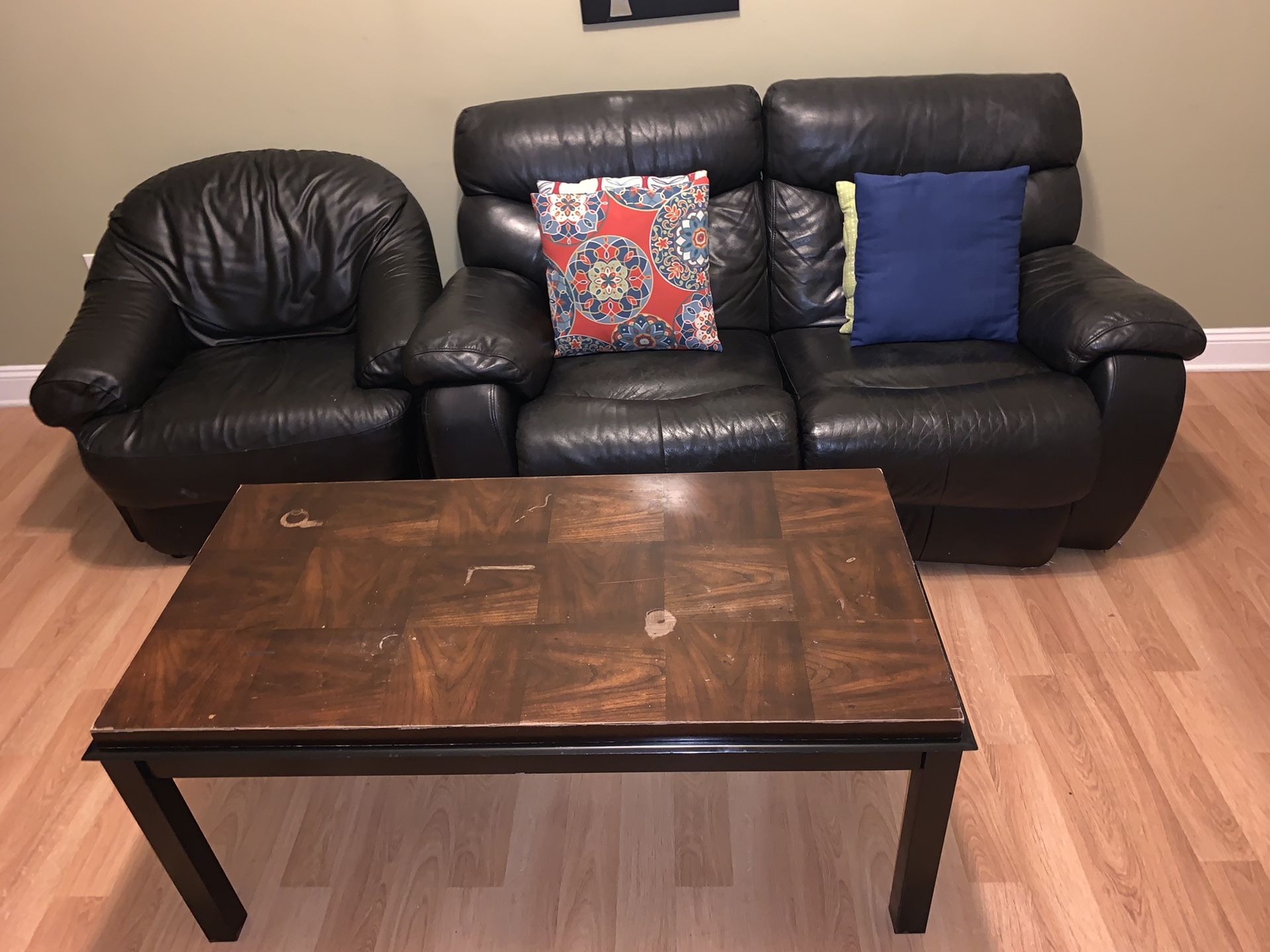 Used Black leather couch set/throw pillows and coffee table