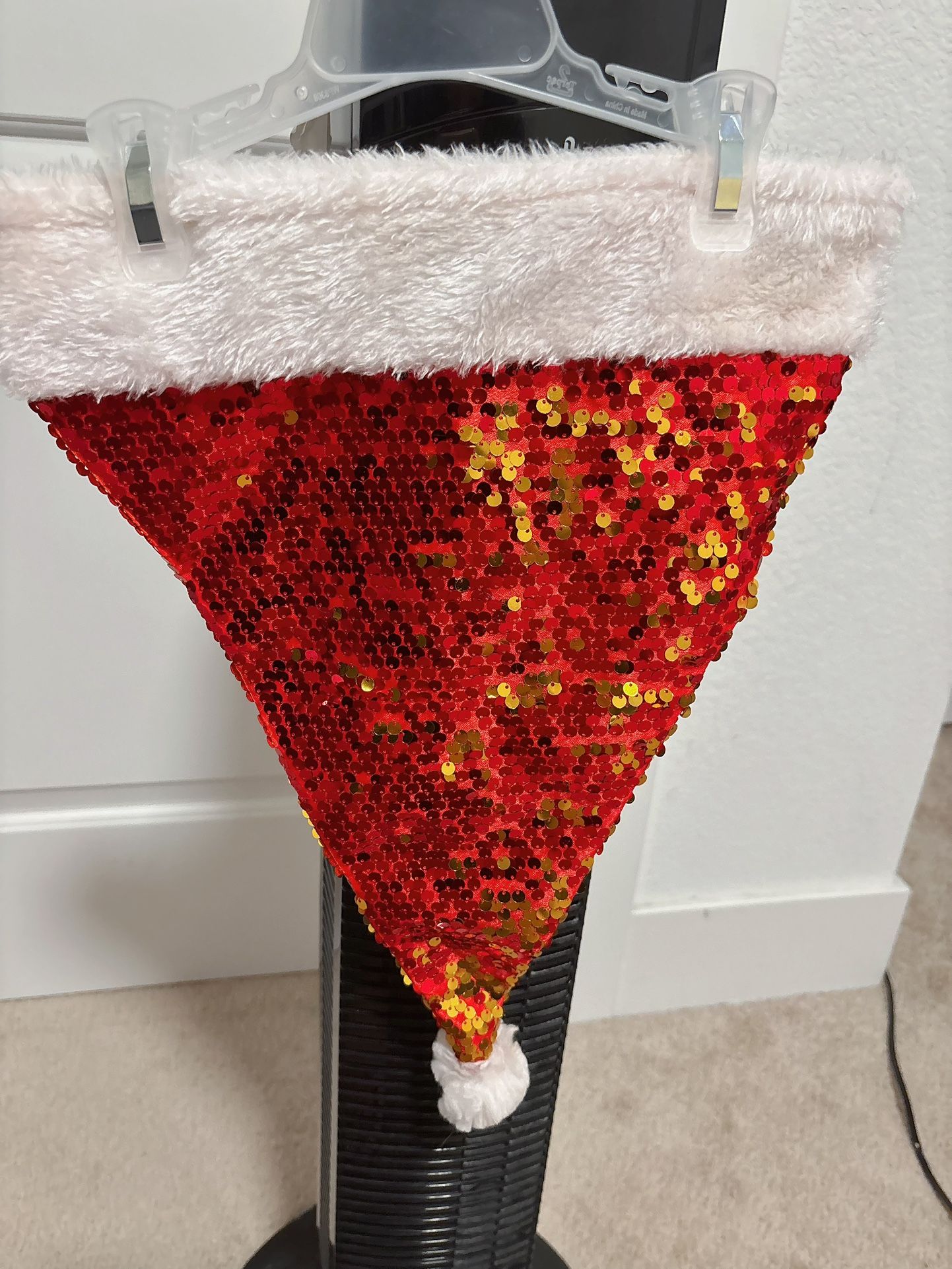 Red shining Christmas hat triangle hat adult hat gift container hat For secret gift receiver or tree decor Comes from pet free smoke free home $2 o