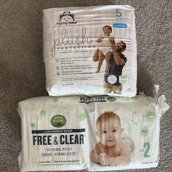 2 Packs Of Diapers 