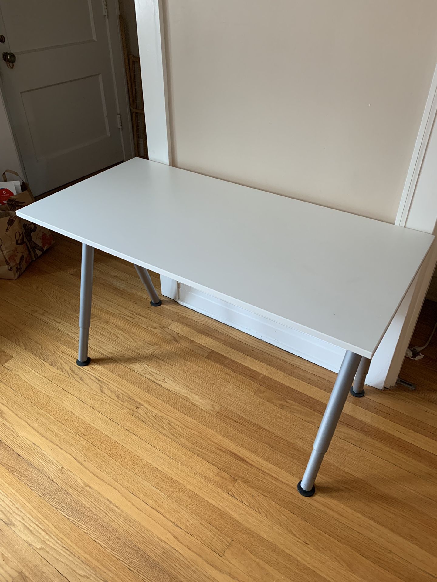 Height Adjustable Desk and matching white chair