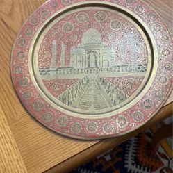 Hanging brass tray from India with picture of Taj Mahal.