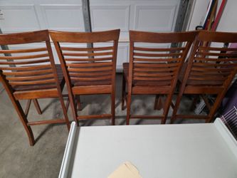 4 wood high chairs $25 each 80 for all