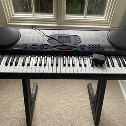 Casio CTK-551 Keyboard w/charger and stand